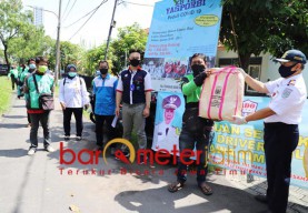 Bagi 500 Paket Sembako, Dishub Jatim Harap Ojol Bersabar