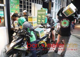Salurkan Bansos Pemerintah, PT AMJ Gandeng Ratusan Ojol