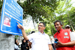Jukir Digital di Surabaya Capai 926 Orang, Kebiasaan Tunai Masih Jadi Kendala!
