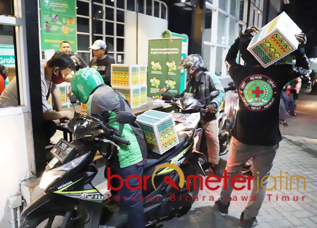 Salurkan Bansos Pemerintah, PT AMJ Gandeng Ratusan Ojol